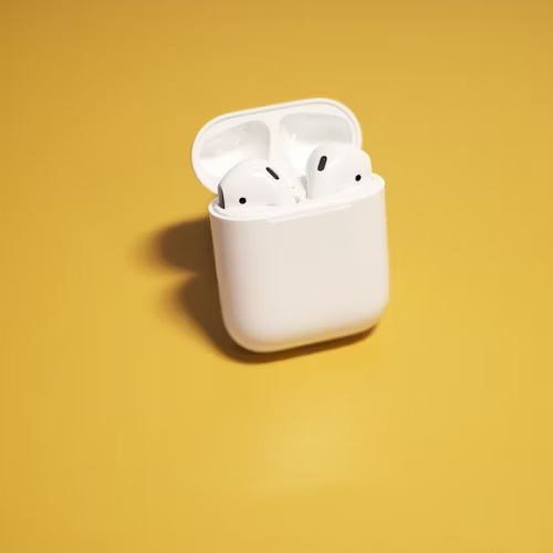 airpods albe pe fond galben