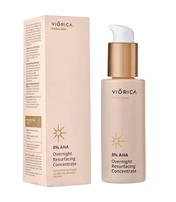 cremă cosmetică în ambalaj roz cu o cutie lângă